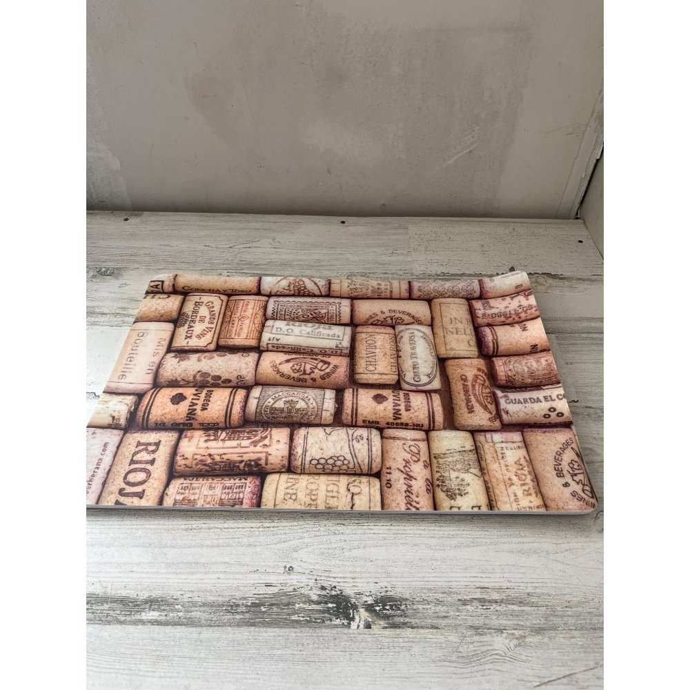 Set of four plastic/foam placemats with cork designs